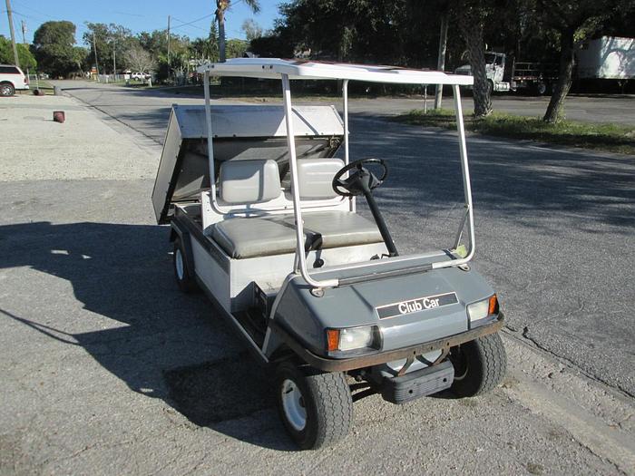 Used Club car electric utility cart with dump bed