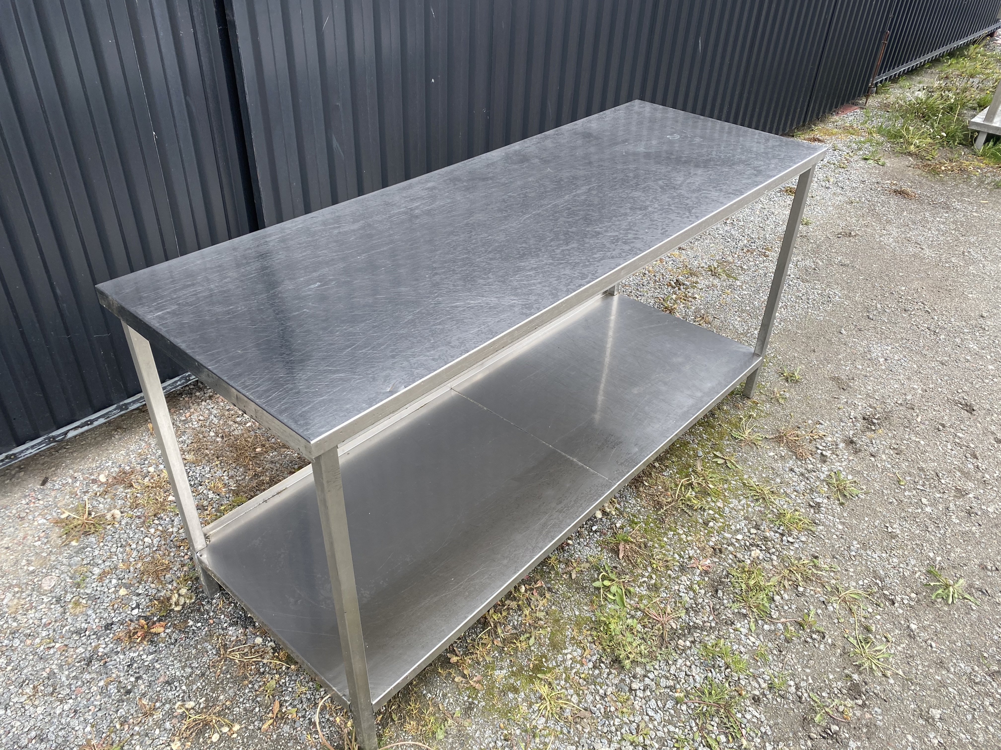 Begagnad Arbetsbord rostfritt 180x65cm