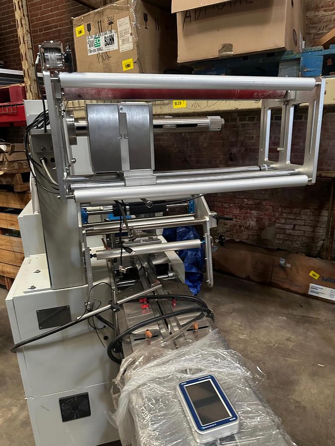 Used BAIRESPACK TORONTO-NVA-3S/144 HORIZONTAL FLOW WRAPPER PACKAGE
