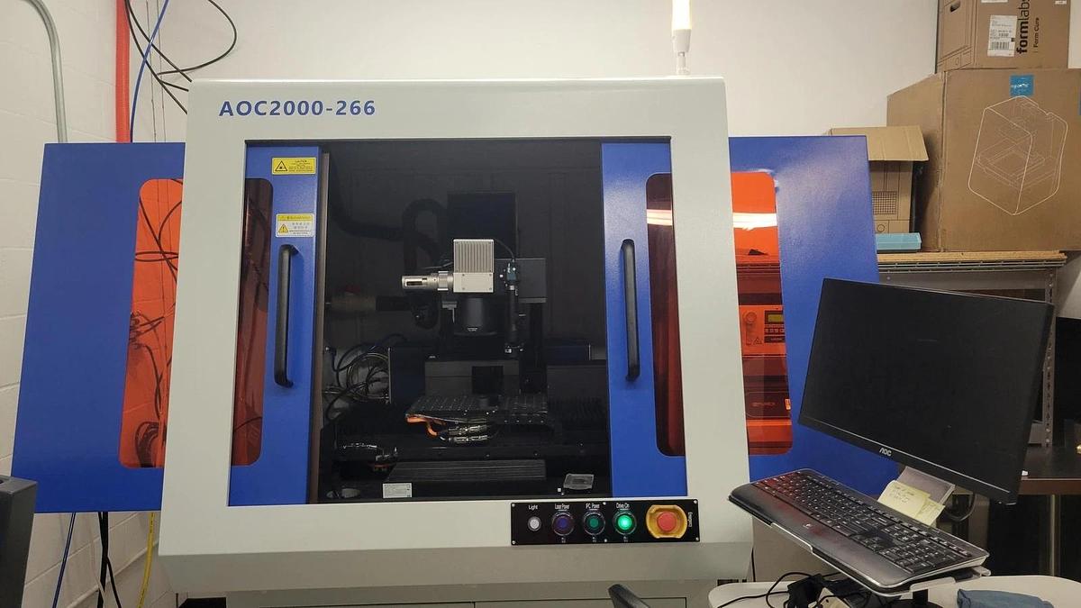 Used Advanced AOC2000-266 Laser system, smoke evacuator, and chiller