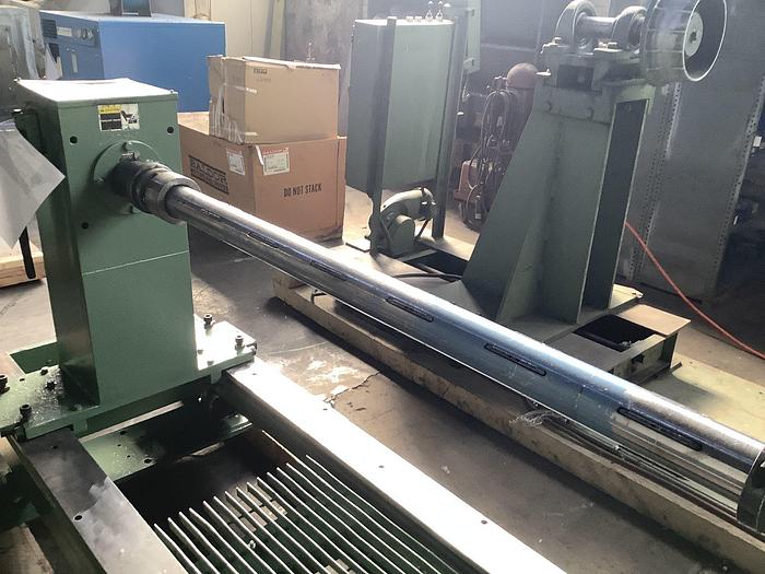 Used 70" LEMBO UNWIND STAND WITH EDGE GUIDE AND 50" DIAMETER- PENDING SALE