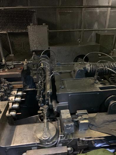 Used NATIONAL MODEL 204XL LONG STROKE 4 DIE PROGRESSIVE HEADER LINE