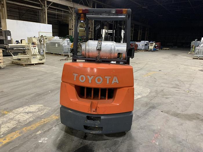 Used 8,000 POUND TOYOTA FORKLIFT MODEL 7FGCU35 WITH 63" CASCADE PAPER CLAMP