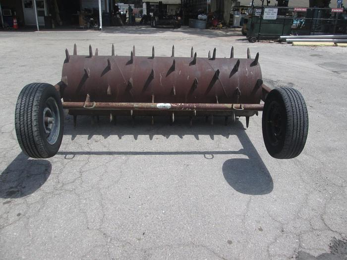Used 8' Powell Pull Behind Aerator