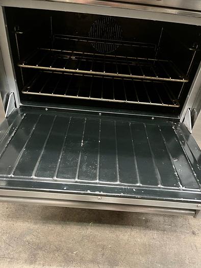 Used Garland reconditioned 6 burner with convection oven