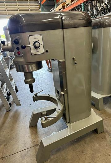 Refurbished Hobart H600T single phase 2 horsepower auto-lift 60 quart mixer comes with a stainless steel bowl and one attachment