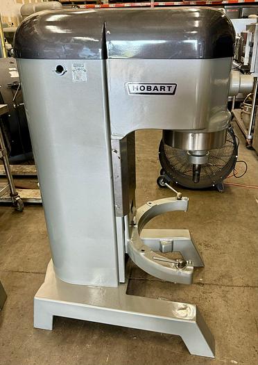 Refurbished Hobart H600T single phase 2 horsepower auto-lift 60 quart mixer comes with a stainless steel bowl and one attachment