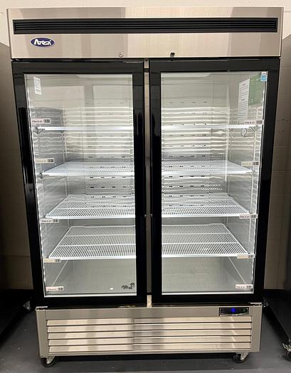 Used Atosa MCF8703ES 54 2/5" W x 31 7/10" D x 83 1/10" H Two-Section Hinged Glass Doors Freezer Merchandiser