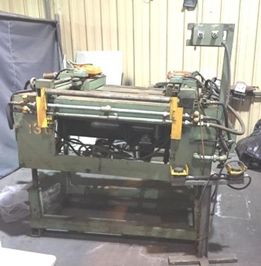 Used Coilmatic DXHF Stock Feeder | 12" Pull, Double Gripper Air Feed