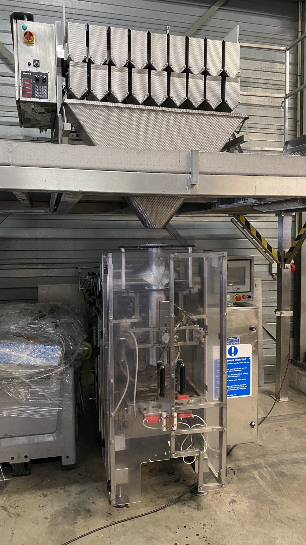 Used Newtec 9 channel weighing line