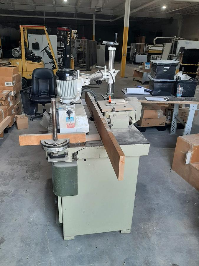 Used SCM  T130 Shaper with sliding table and feeder