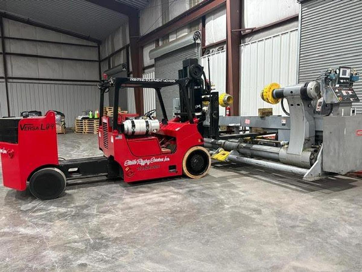 Used Marquip 72" x 72" Dual Shaftless Floor Pickup Unwind Stand 1999
