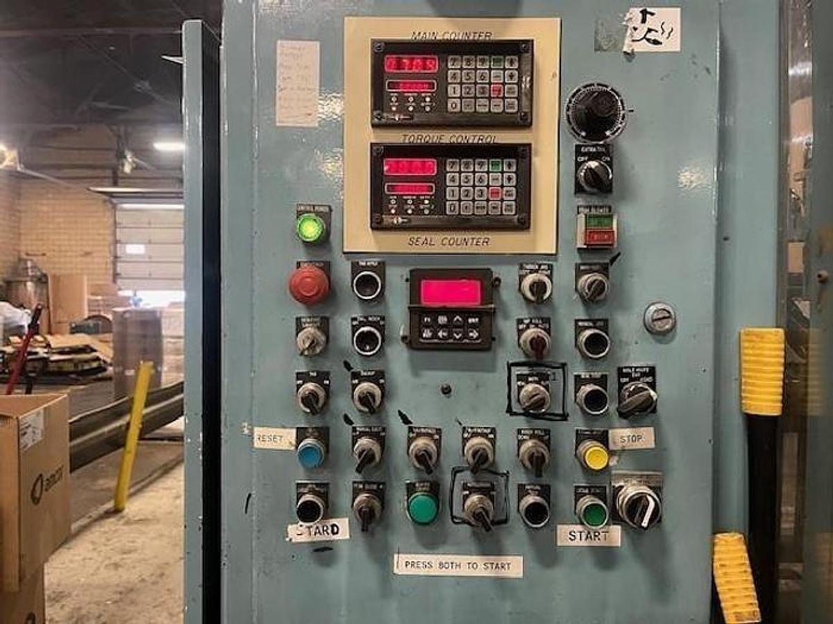 Used 54" Jennerjahn Counter Roll Rewinder with Slitting Rebuilt 2006