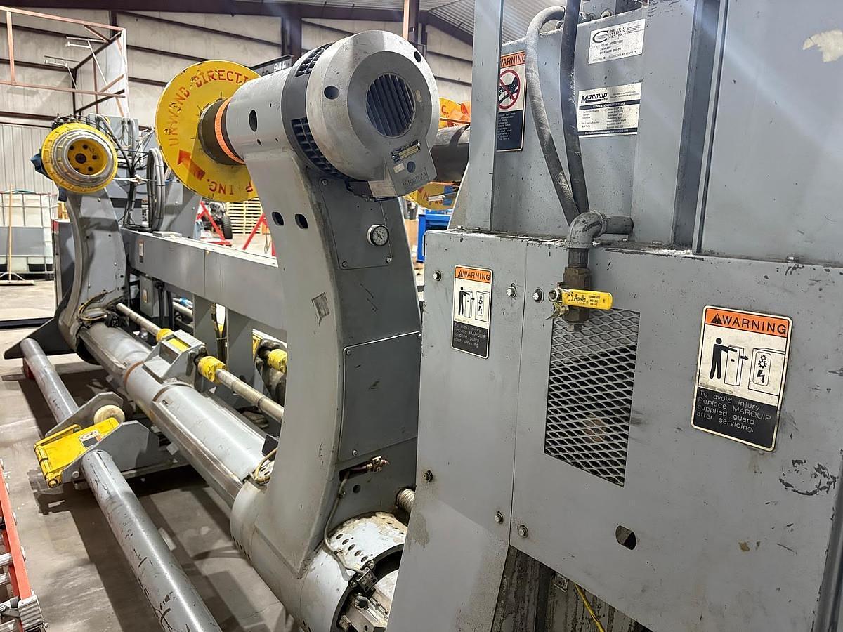 Used Marquip 72" x 72" Dual Shaftless Floor Pickup Unwind Stand 1999