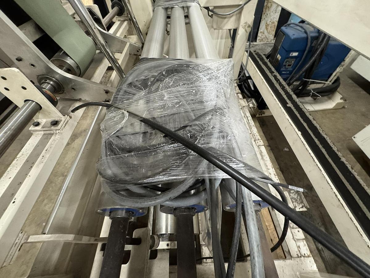 Used Elsner ENR-1000 42" Automatic Nonwoven Wipes Rewinder