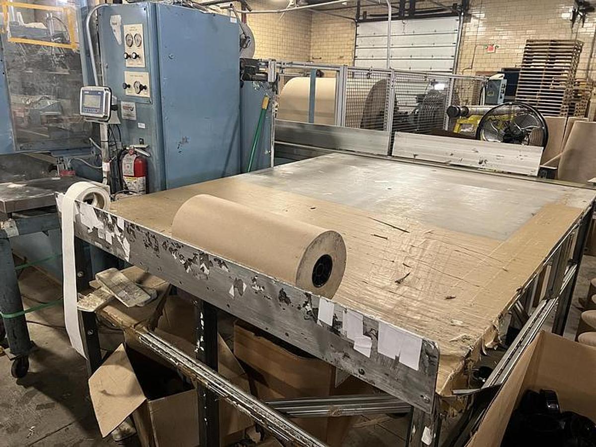 Used 54" Jennerjahn Counter Roll Rewinder with Slitting Rebuilt 2006