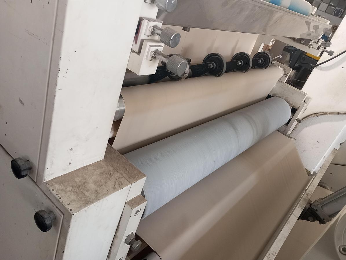 Used 7.5" Hinli C-Fold Napkin Machine with Single Color Printer and Embossing