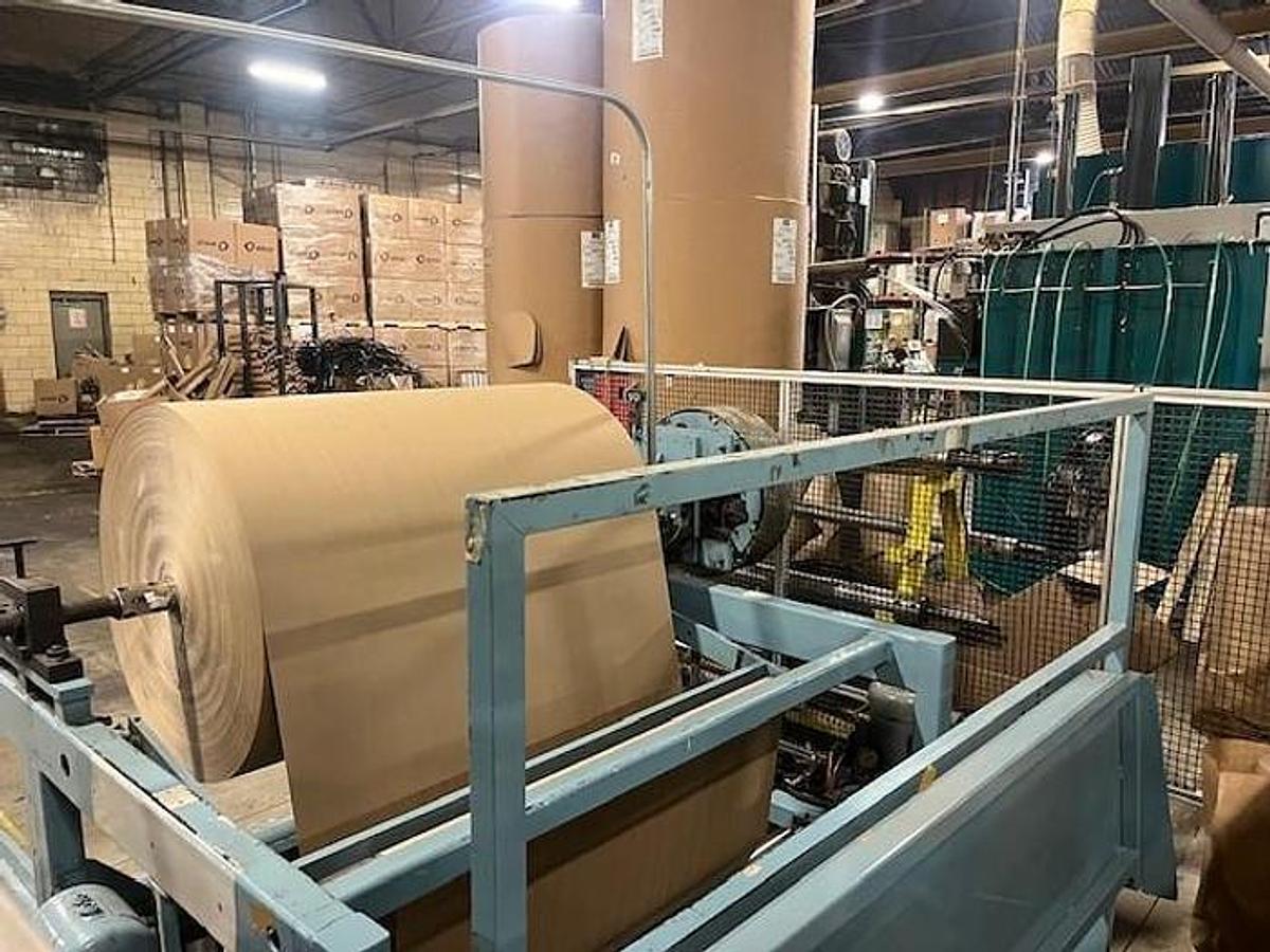 Used 54" Jennerjahn Counter Roll Rewinder with Slitting Rebuilt 2006