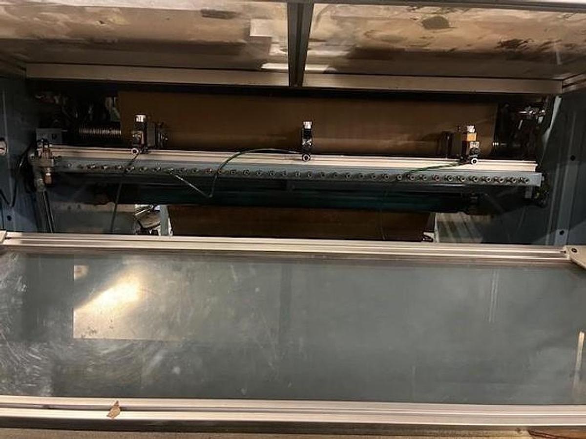 Used 54" Jennerjahn Counter Roll Rewinder with Slitting Rebuilt 2006