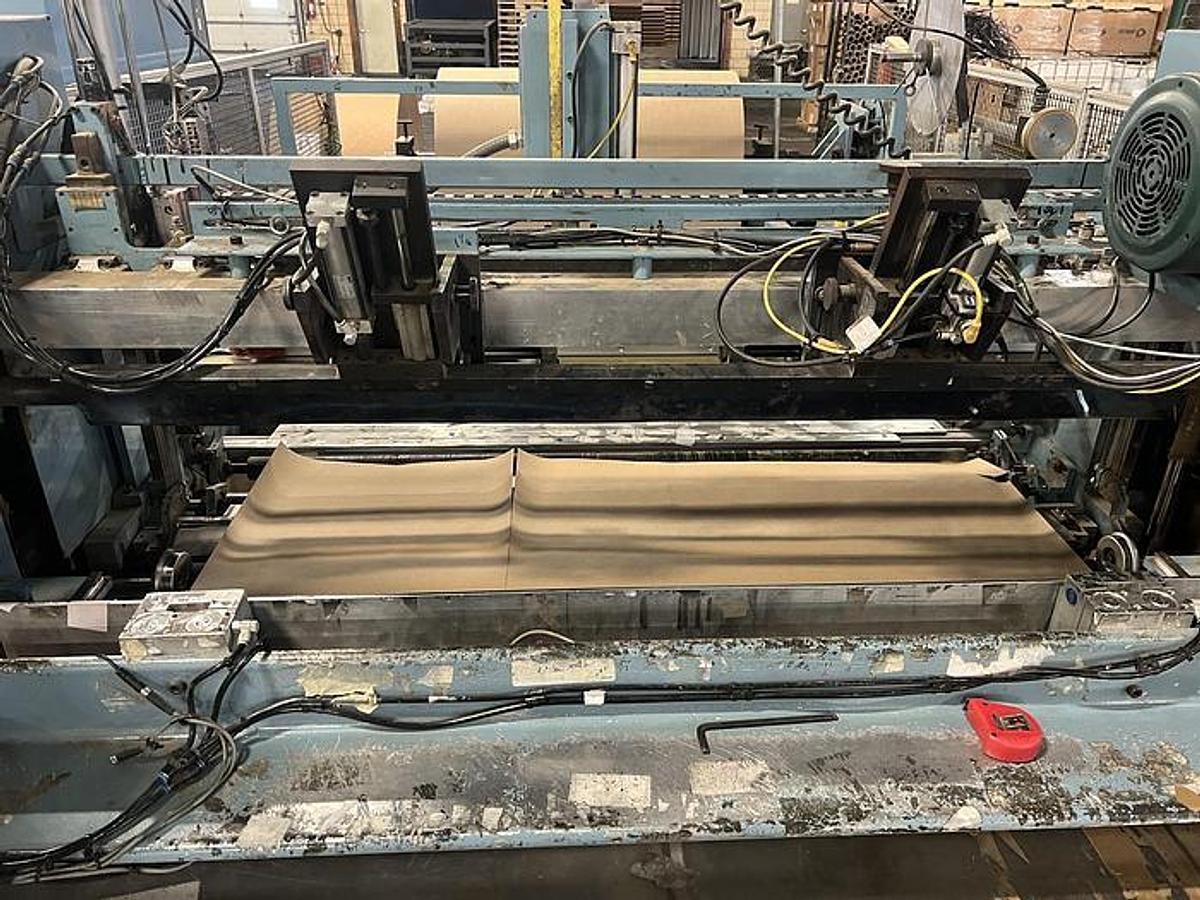 Used 54" Jennerjahn Counter Roll Rewinder with Slitting Rebuilt 2006