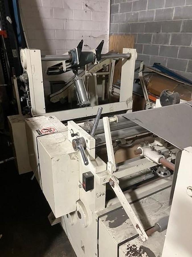 Used 16.5" Hero 1/8 Fold Dinner Napkin Folder