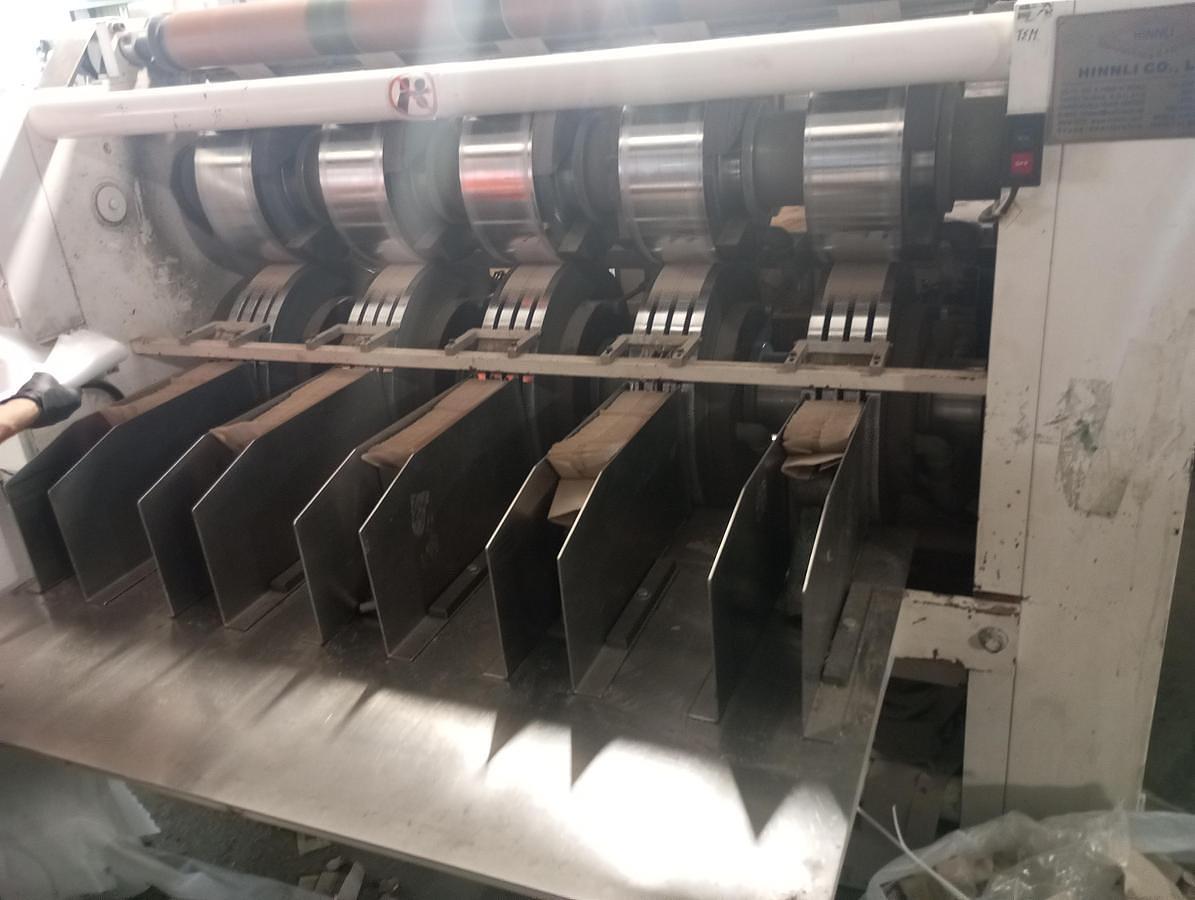 Used 7.5" Hinli C-Fold Napkin Machine with Single Color Printer and Embossing