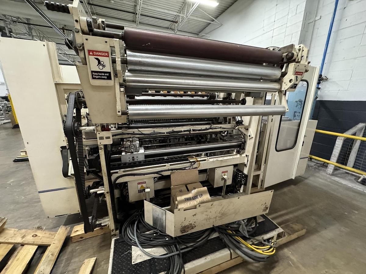 Used Elsner ENR-1000 42" Automatic Nonwoven Wipes Rewinder