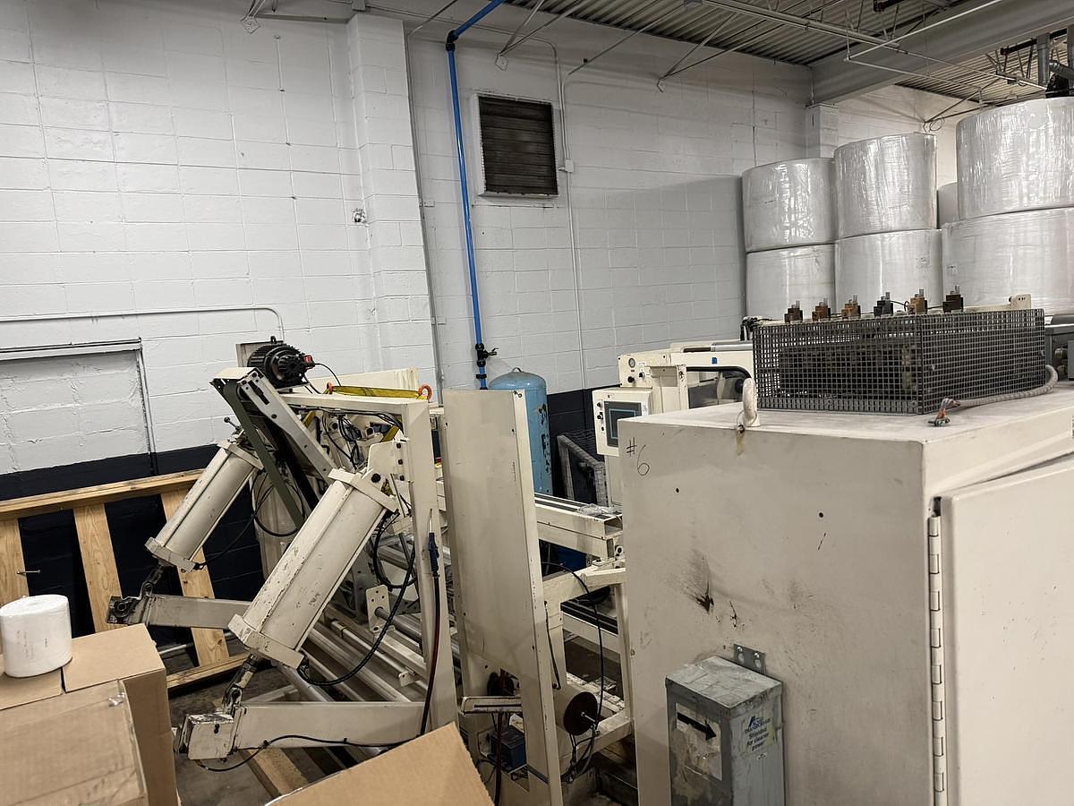 Used Elsner ENR-1000 42" Automatic Nonwoven Wipes Rewinder