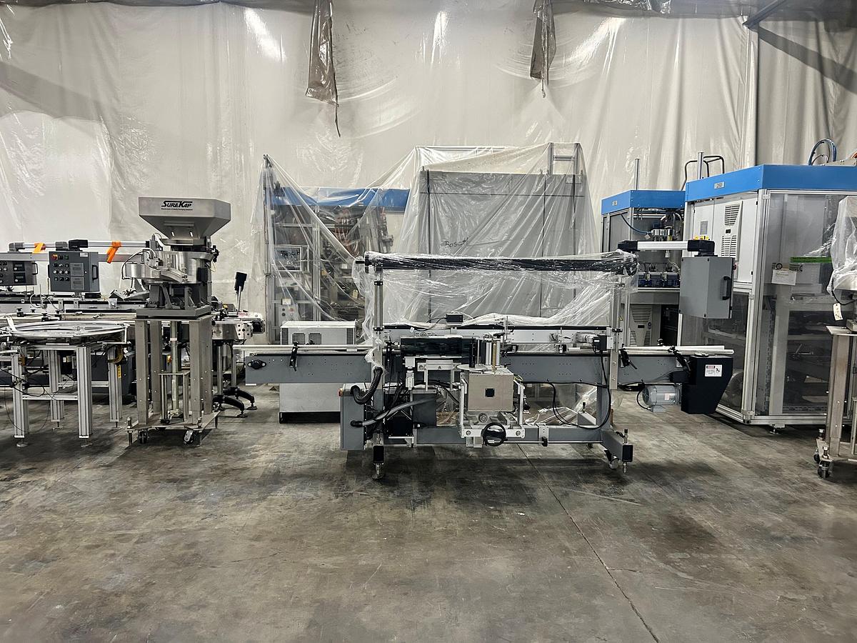 Used Universal Labeling Systems Sure Kap