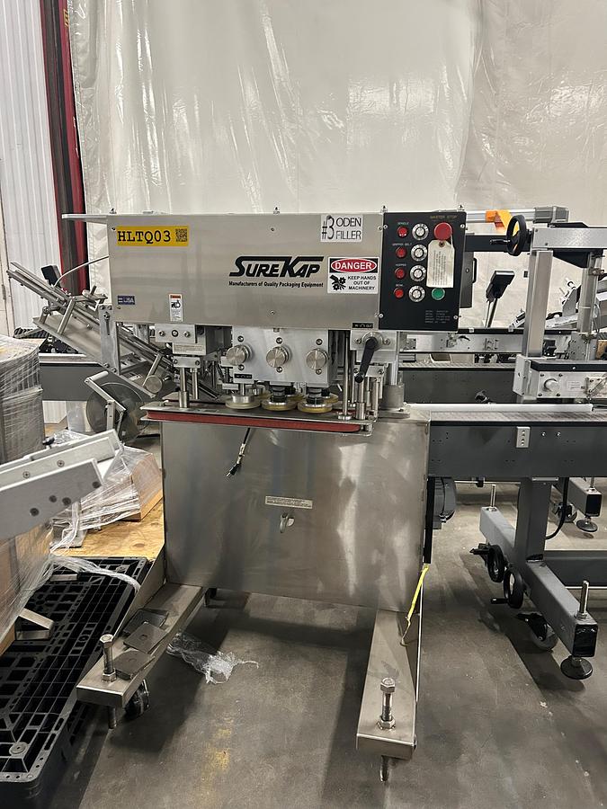 Used Universal Labeling Systems Sure Kap