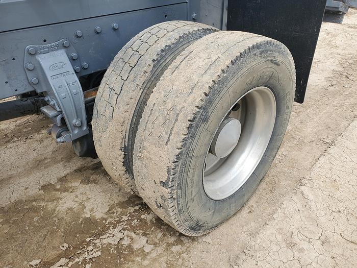 Used 1990 Peterbilt w/ New Holland 1051 Stack Retriever