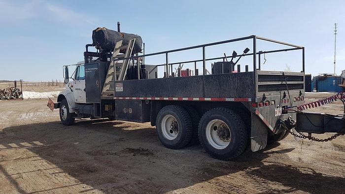 Used 2000 INTERNATIONAL-IHC 4900 Series Tandem Axle Deck Truck