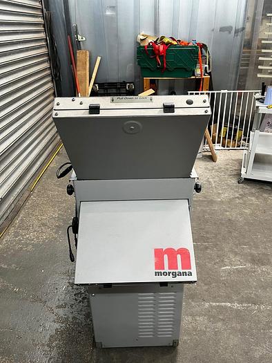 Used Morgana docufold folding machine for paper folding and perf