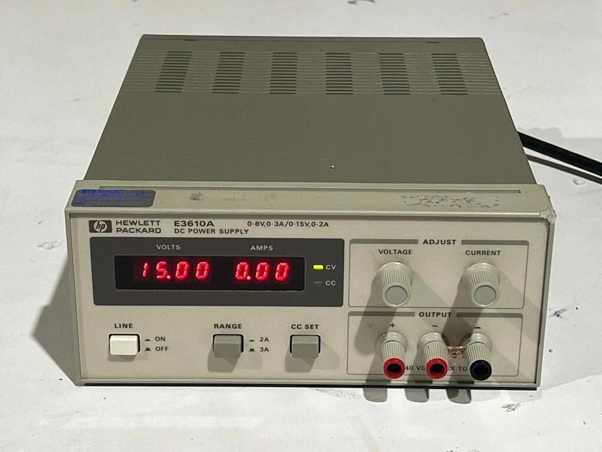 Used Hewlett Packard HP Model E3610A  Adjustable Power Supply 0-8V, 0-3A/0-15V, 0-2A