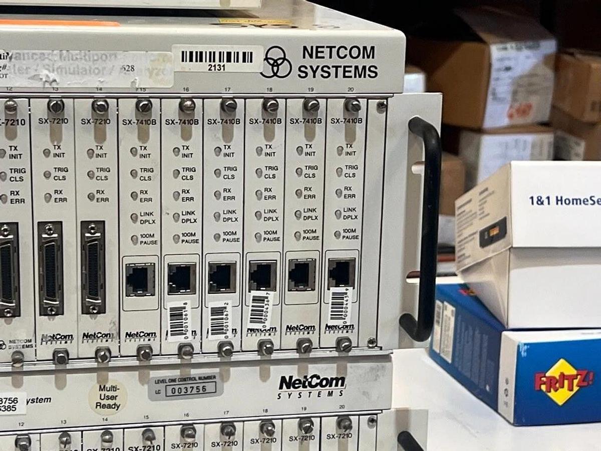 Used Lot of 2 Each: SmartBits 200 & 2000 Systems + 16 Each: SX-7410B & Manual