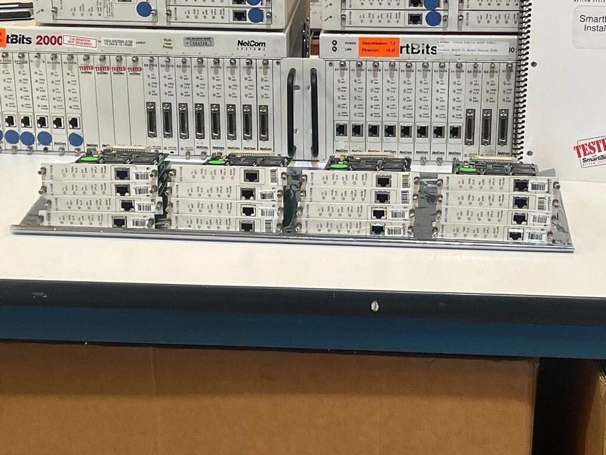 Used Lot of 2 Each: SmartBits 200 & 2000 Systems + 16 Each: SX-7410B & Manual