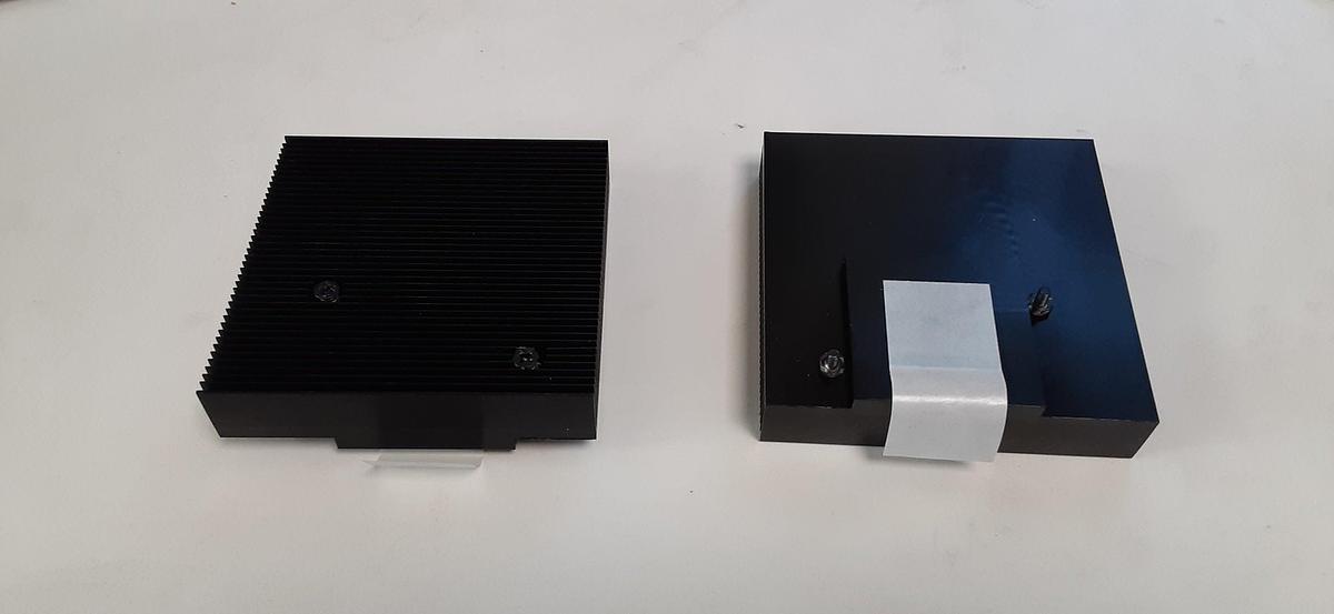 Used 88X88X23 Heatsink w/ adhesive tape backing and two spring loaded bolts for attachment ES4704