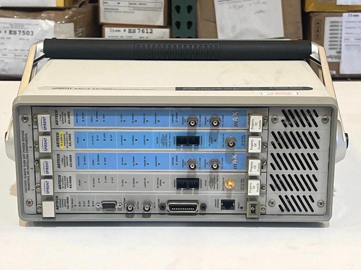 Used Spirent Adtech AX/4000 P/N: 400143 - Broadband Test System with 5 Modules, OC-3c