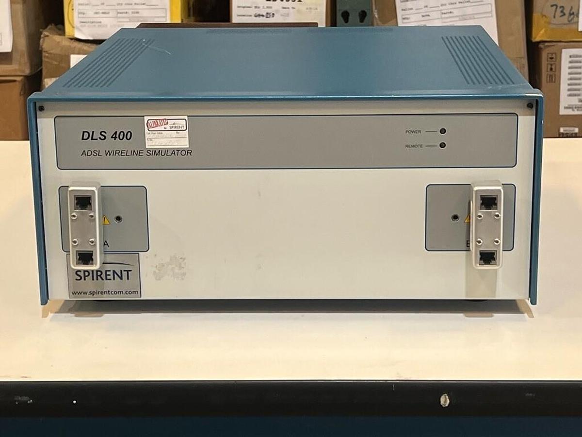 Used Spirent DLS 400 ADSL Wireline Simulator w/ 2 Each: 710201-0243 DIN/RJ45 Adapters