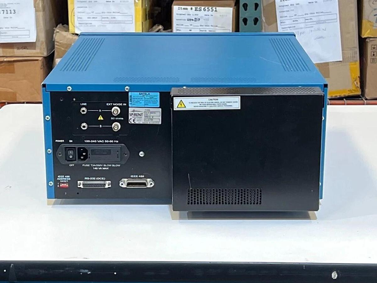 Used Spirent DLS 400 ADSL Wireline Simulator w/ 2 Each: 710201-0243 DIN/RJ45 Adapters