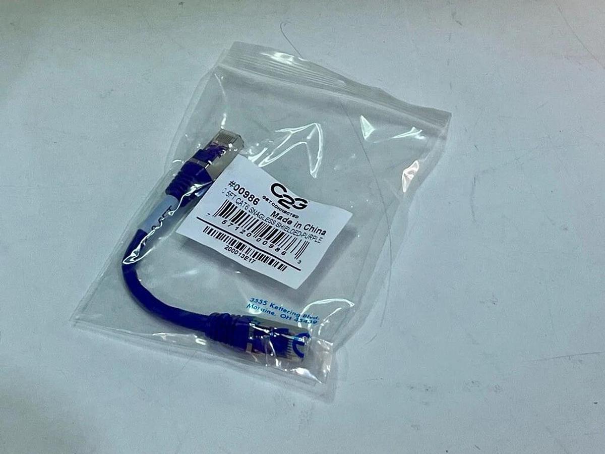 Used Box of 45: C2G #00986 0.5ft Purple Cat6 Snagless Shielded (STP) Ethernet Cables