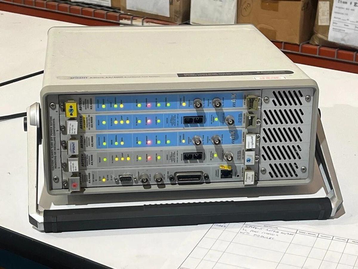 Used Spirent Adtech AX/4000 P/N: 400143 - Broadband Test System with 5 Modules OC-12c