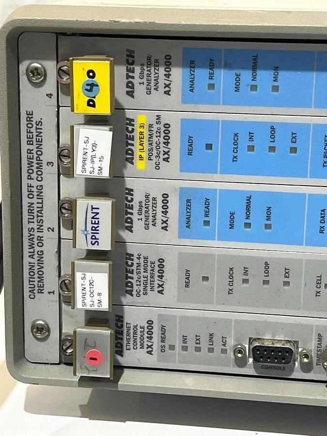 Used Spirent Adtech AX/4000 P/N: 400143 - Broadband Test System with 5 Modules OC-12c