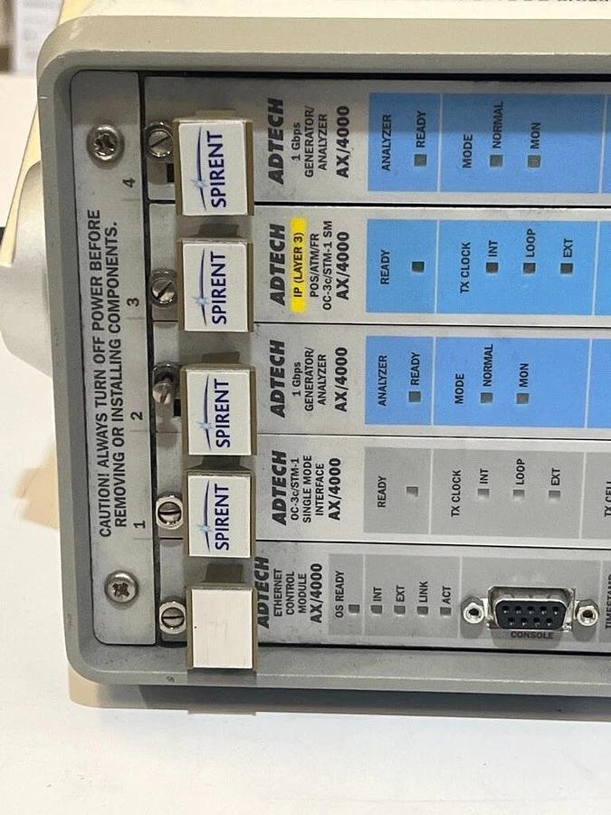 Used Spirent Adtech AX/4000 P/N: 400143 - Broadband Test System with 5 Modules, OC-3c