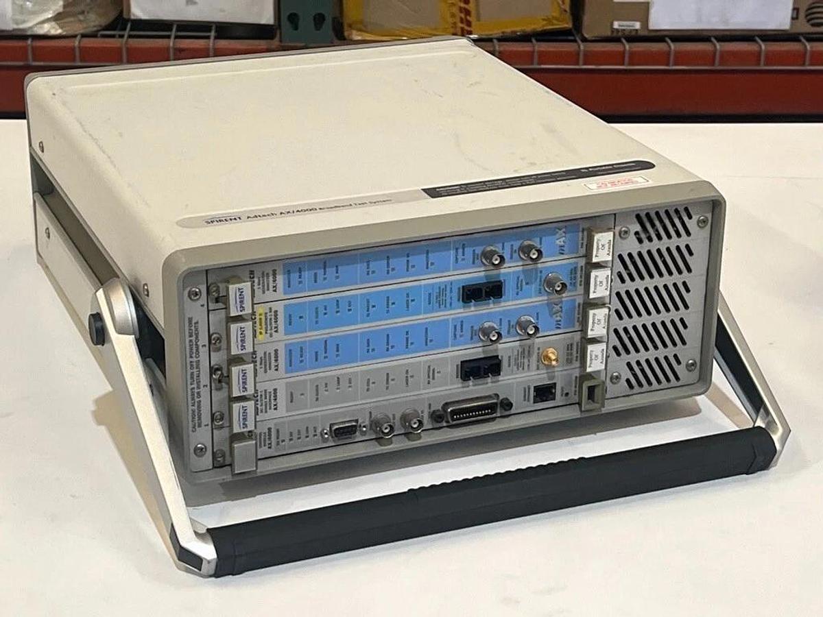 Used Spirent Adtech AX/4000 P/N: 400143 - Broadband Test System with 5 Modules, OC-3c