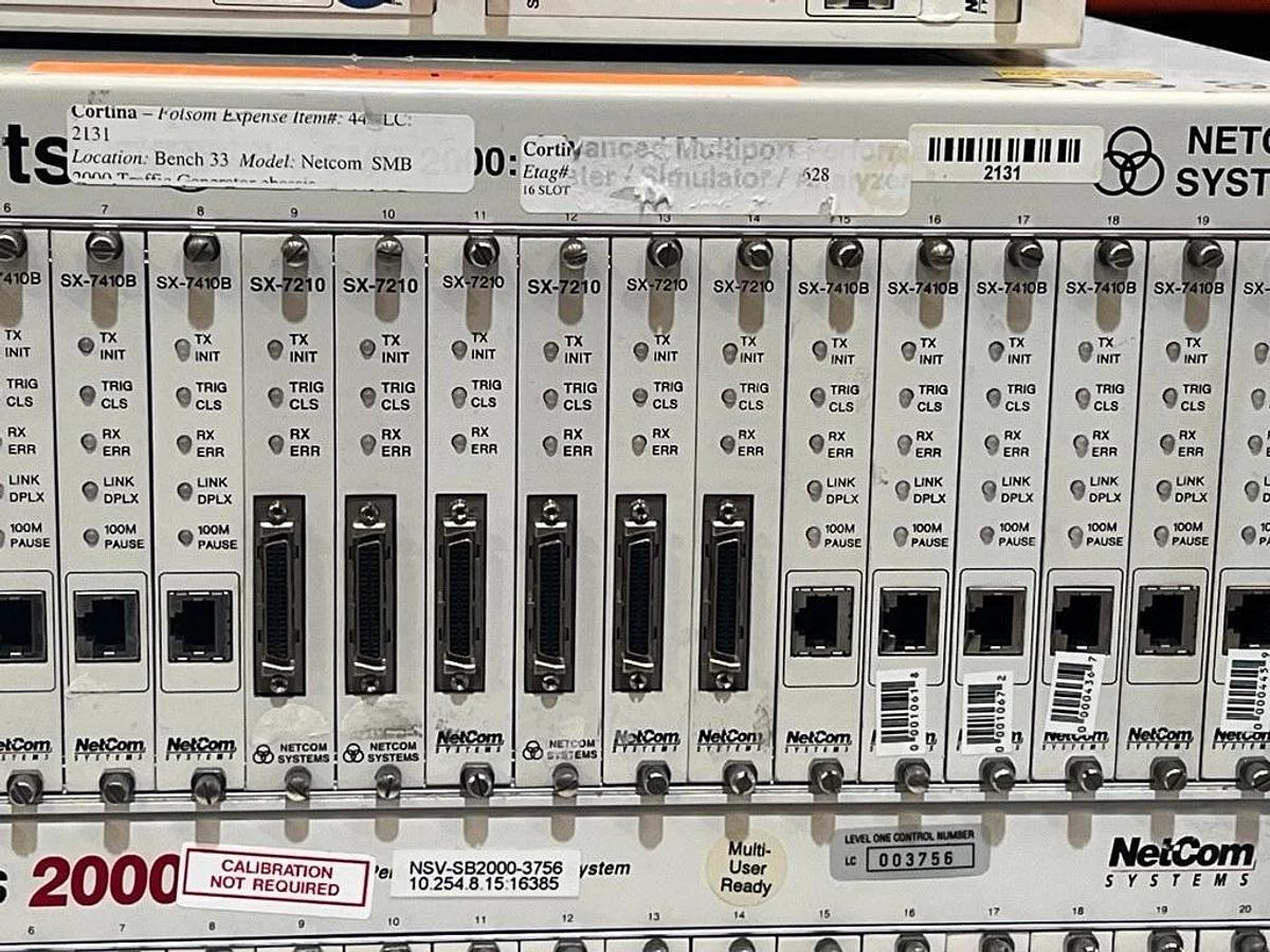 Used Lot of 2 Each: SmartBits 200 & 2000 Systems + 16 Each: SX-7410B & Manual