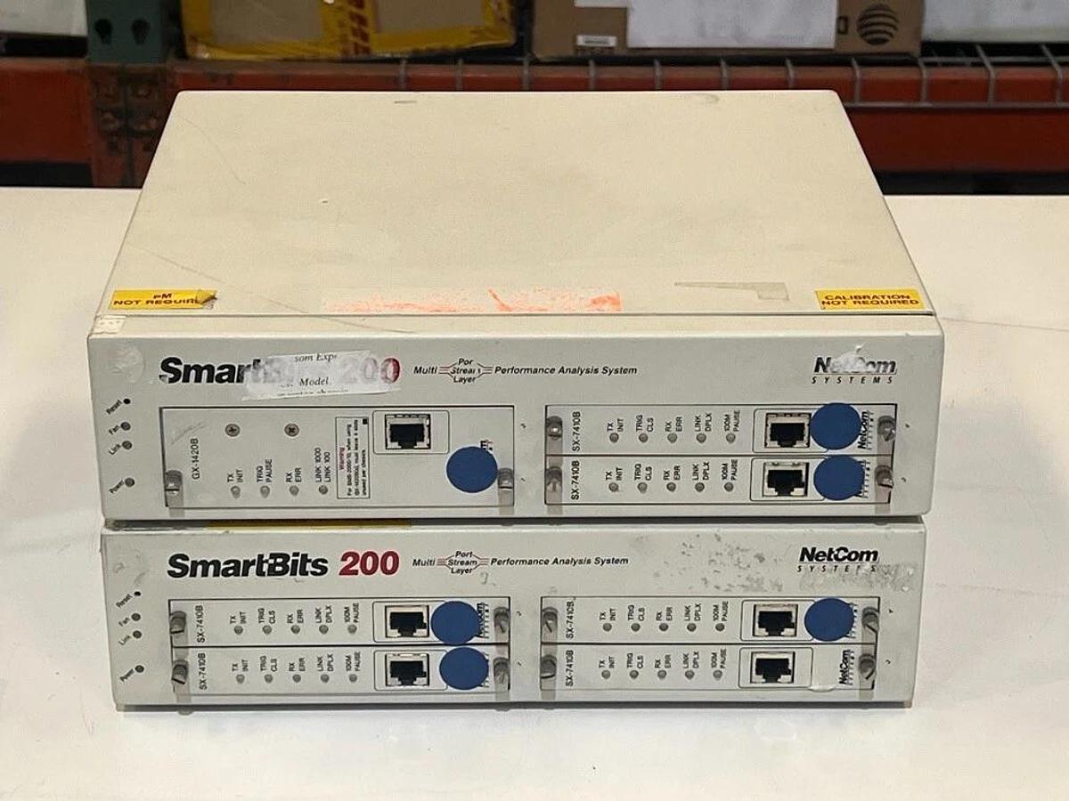 Used Lot of 2 Each: SmartBits 200 & 2000 Systems + 16 Each: SX-7410B & Manual
