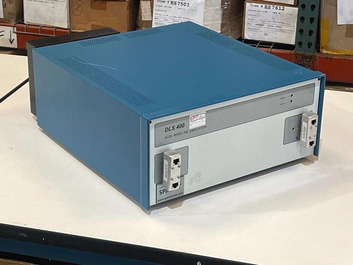 Used Spirent DLS 400 ADSL Wireline Simulator w/ 2 Each: 710201-0243 DIN/RJ45 Adapters