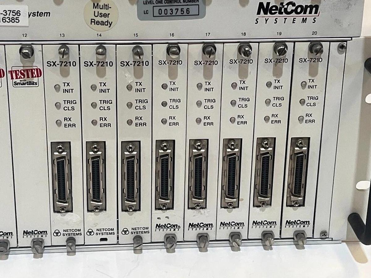 Used Lot of 2 Each: SmartBits 200 & 2000 Systems + 16 Each: SX-7410B & Manual