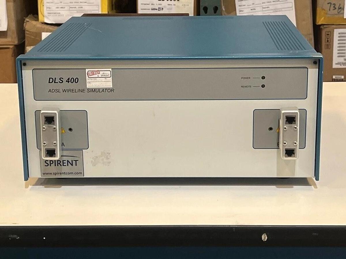Used Spirent DLS 400 ADSL Wireline Simulator w/ 2 Each: 710201-0243 DIN/RJ45 Adapters